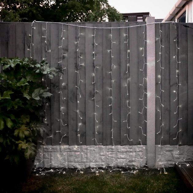 Instalatie Craciun, Tip Perdea, IP44, 10 m x 2 m, 1200 LED-uri, Alb rece, cu flash, Transformator cu telecomanda, Interconectabila, Prelungitor 3 m inclus, Fir transparent, Interior/ Exterior, Flippy