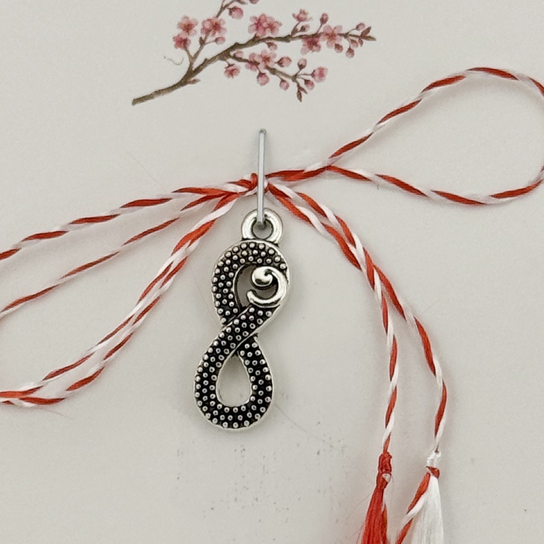 Martisor Traditional, Jolie, Model Infinit, cu Snur Impletit Alb/Rosu, 8.5 x 5.5 cm. Argintiu