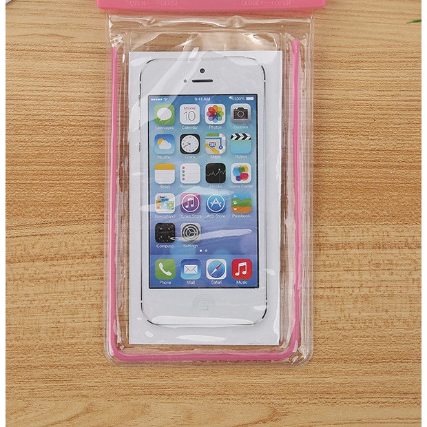 Husa subacvatica Fosforescenta Waterproof Flippy, Snowproof, Lumineaza in intuneric, Universala, cu Snur, pentru telefon sau documente, Roz