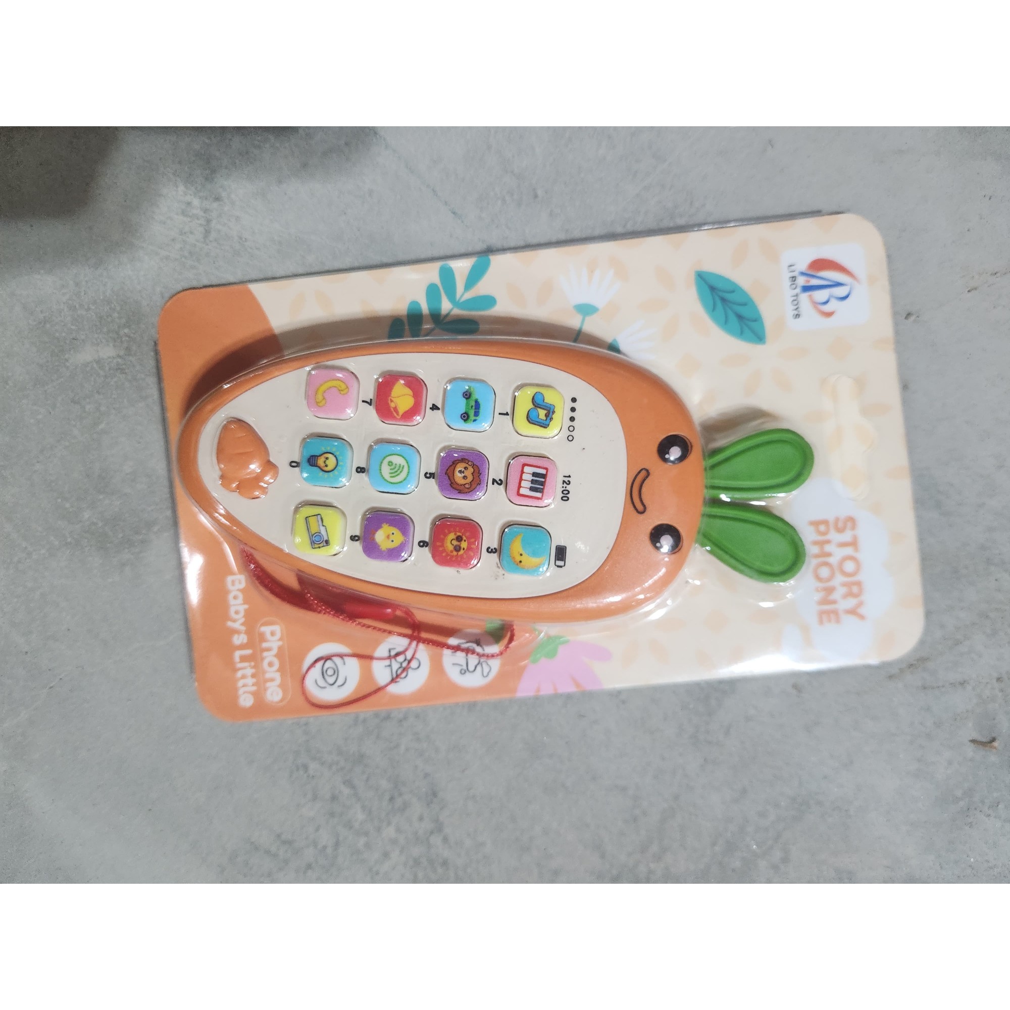 Jucarie Interactiva, Flippy, Telefon Inteligent, Model Morcov, Functii Educative, Muzicale si Voce, 4-6 ani, 19 x 11.5 cm, din Plastic, Portocaliu