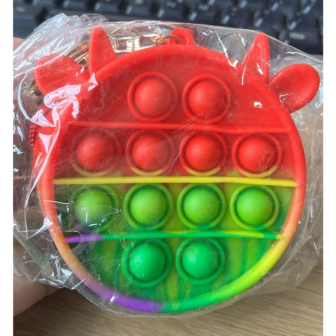 Jucarie Antistres din Silicon, Flippy, Pop It Now And Flip It, Portofel, 6 cm, Vacuta Multicolor