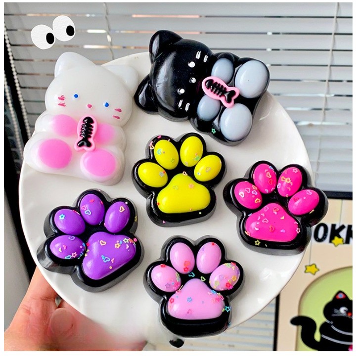 Set 12 Jucarii Antistres Squishy, Flippy, cu Revenire Lenta, Squeeze Pinch Family, Model Labuta de Pisica, 6.8x6.2 cm, 55g, Ambalaj Transparent, 4 Culori