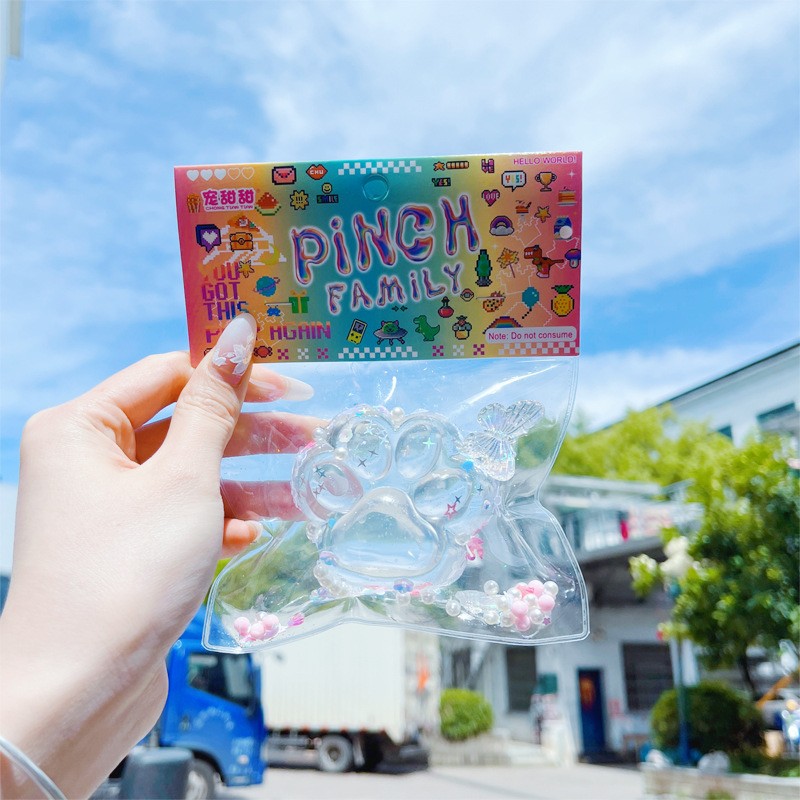 Jucarie Antistres Squishy, Flippy, Labuta de Pisica Pufoasa, cu Revenire Lenta, 6 x 6 cm, Model Crystal Ice, Transparent