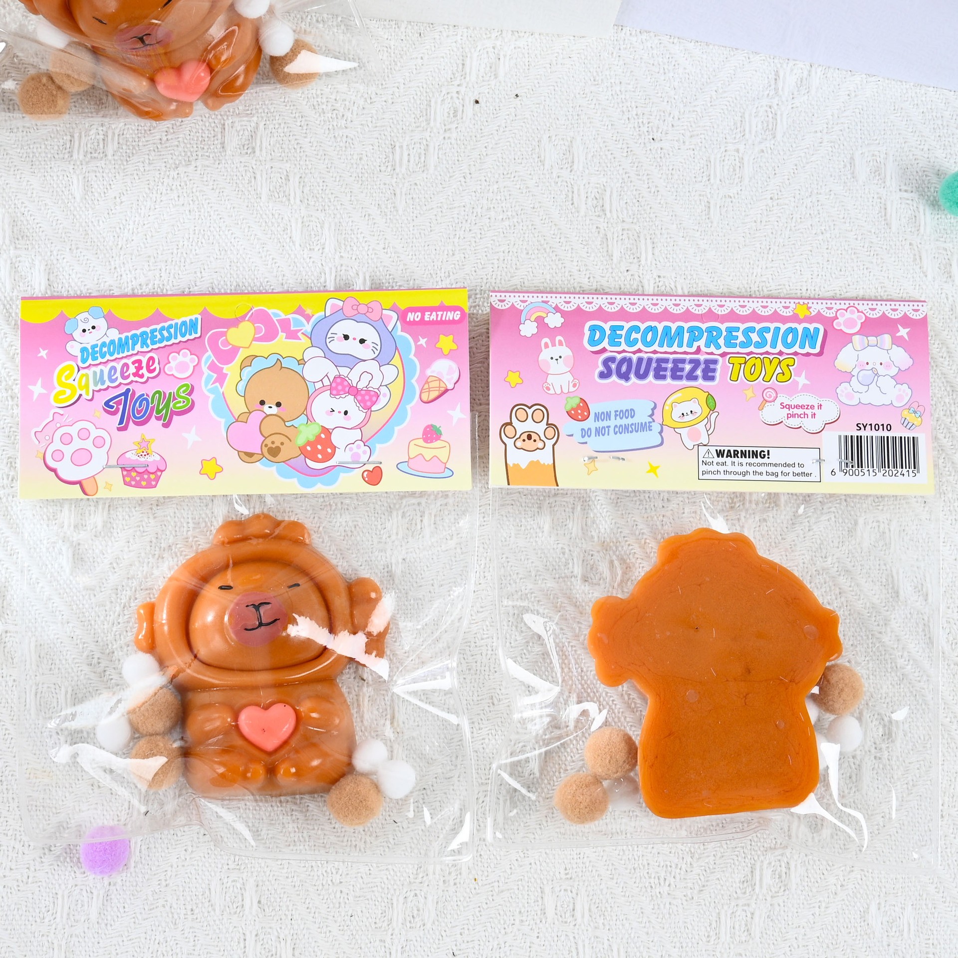 Jucarie Antistres Squishy, Flippy, cu Revenire Lenta, Model Capybara cu Inima, 7.5cmx6.5 cm, din TPR, Ambalaj Transparent, Maro