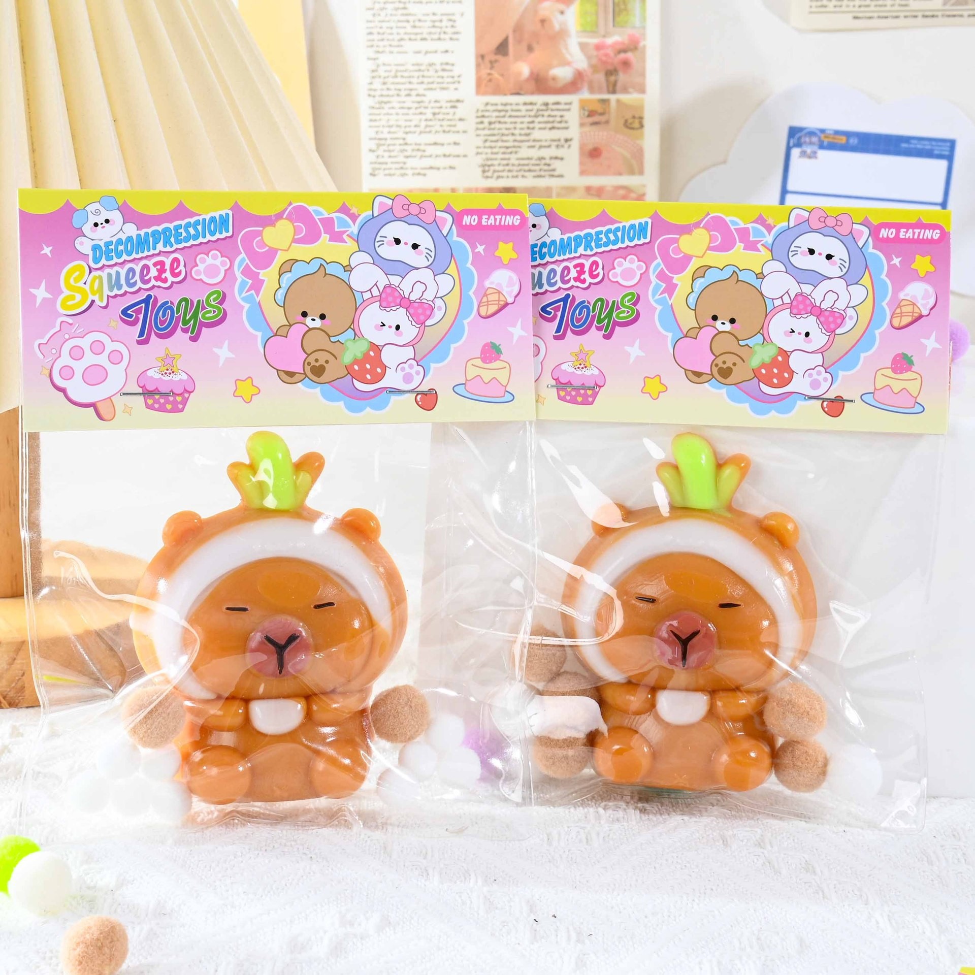 Jucarie Antistres Squishy, Flippy, cu Revenire Lenta, Model Capybara, 7cmx6.5 cm, din TPR, Ambalaj Transparent, Maro