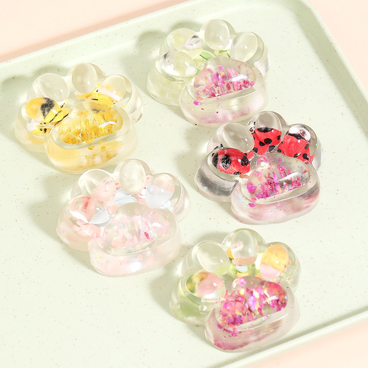 Jucarie Antistres Squishy, Flippy, cu Revenire Lenta, Squeeze Pinch Family, Model Cat Paw, 6.5 x 7 cm, din Tpr, 4-6 Ani, Model 7 Insecte, Transparent