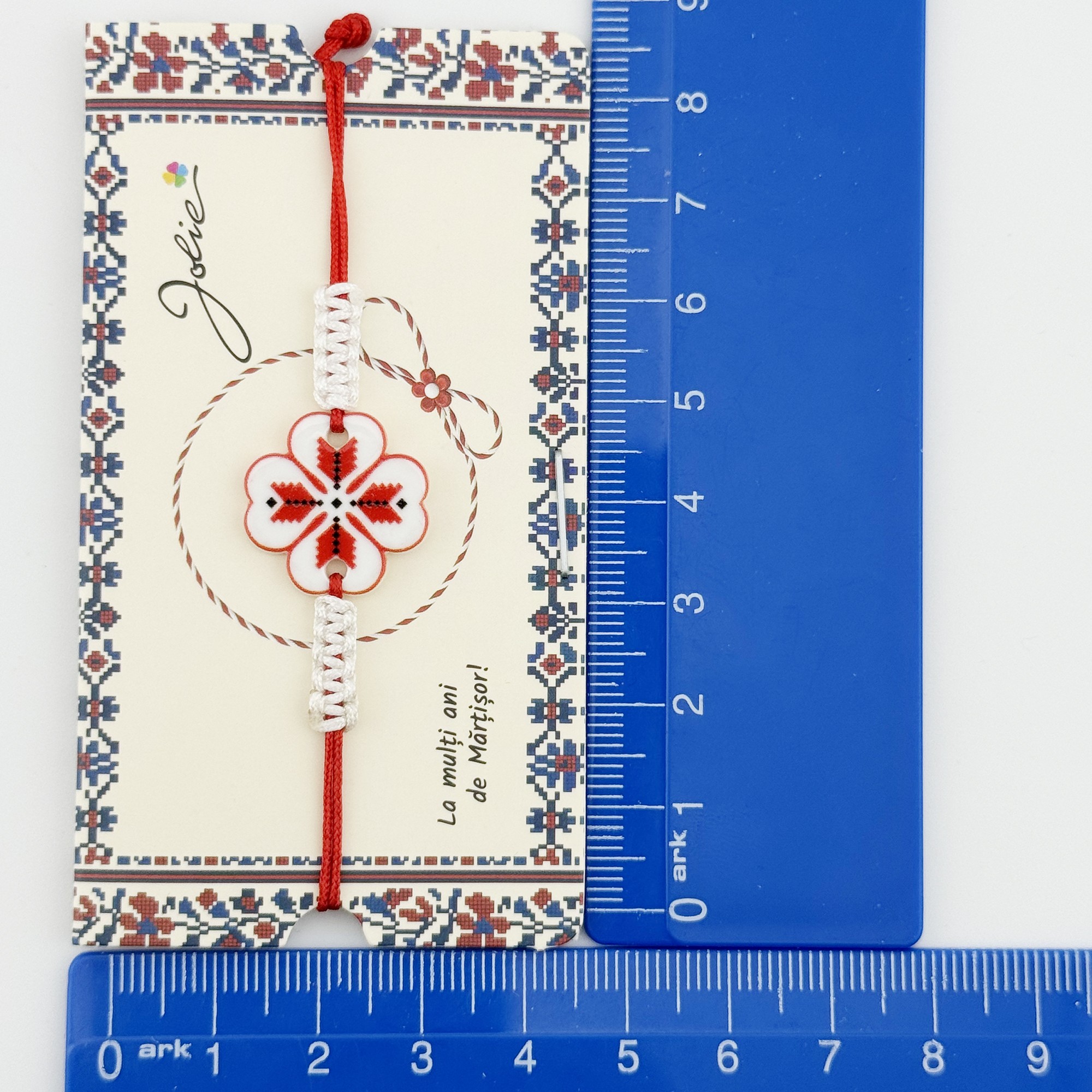 Martisor Traditional Bratara Norocoasa, Jolie, Model Trifoi Port Traditional, Bratara Martisor pentru Copii, din Plastic/Textil, Snur Rosu/Alb