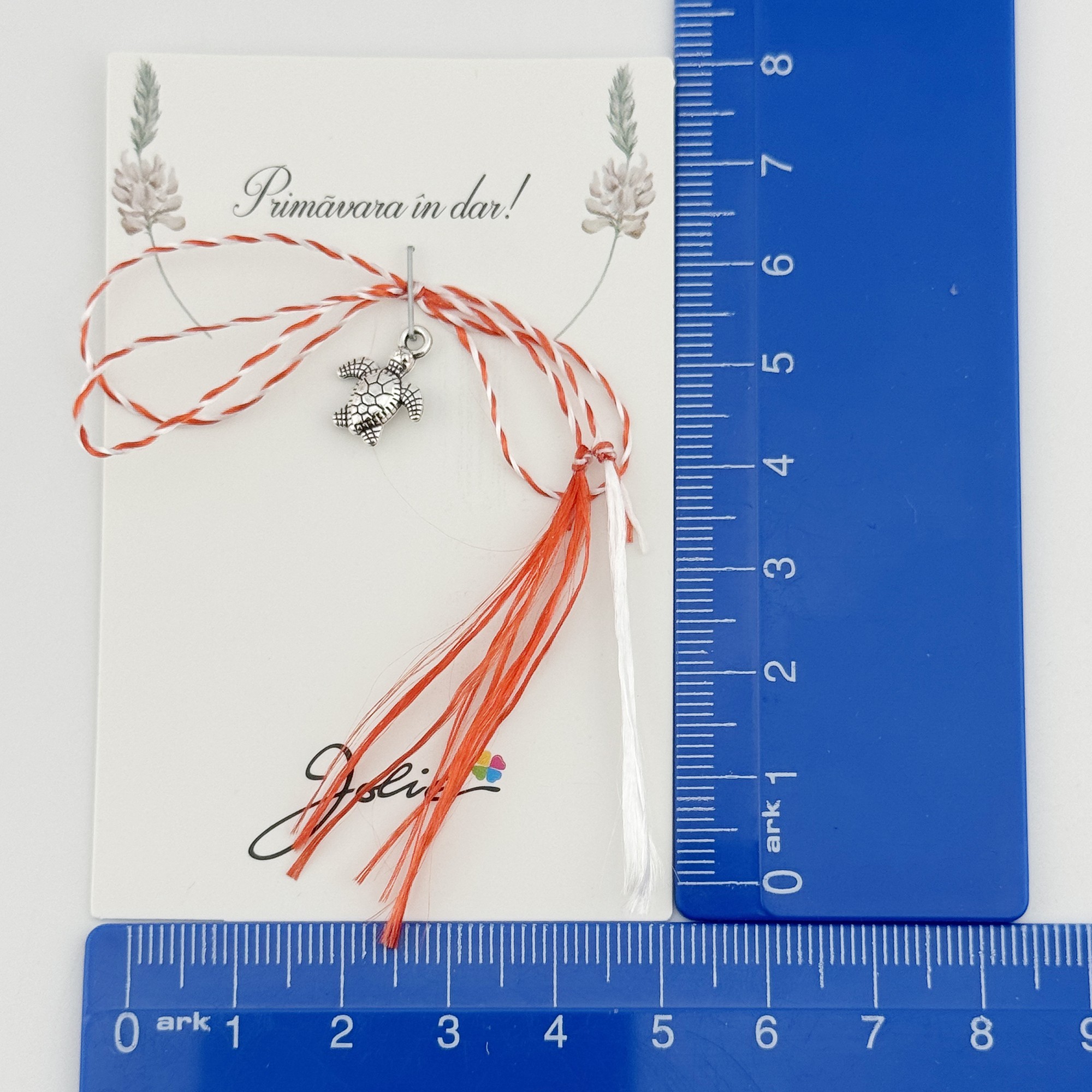 Martisor Traditional, Jolie, Model BROASCA TESTOASA, cu Snur Impletit Alb/Rosu, 8.5 x 5.5 cm. Argintiu