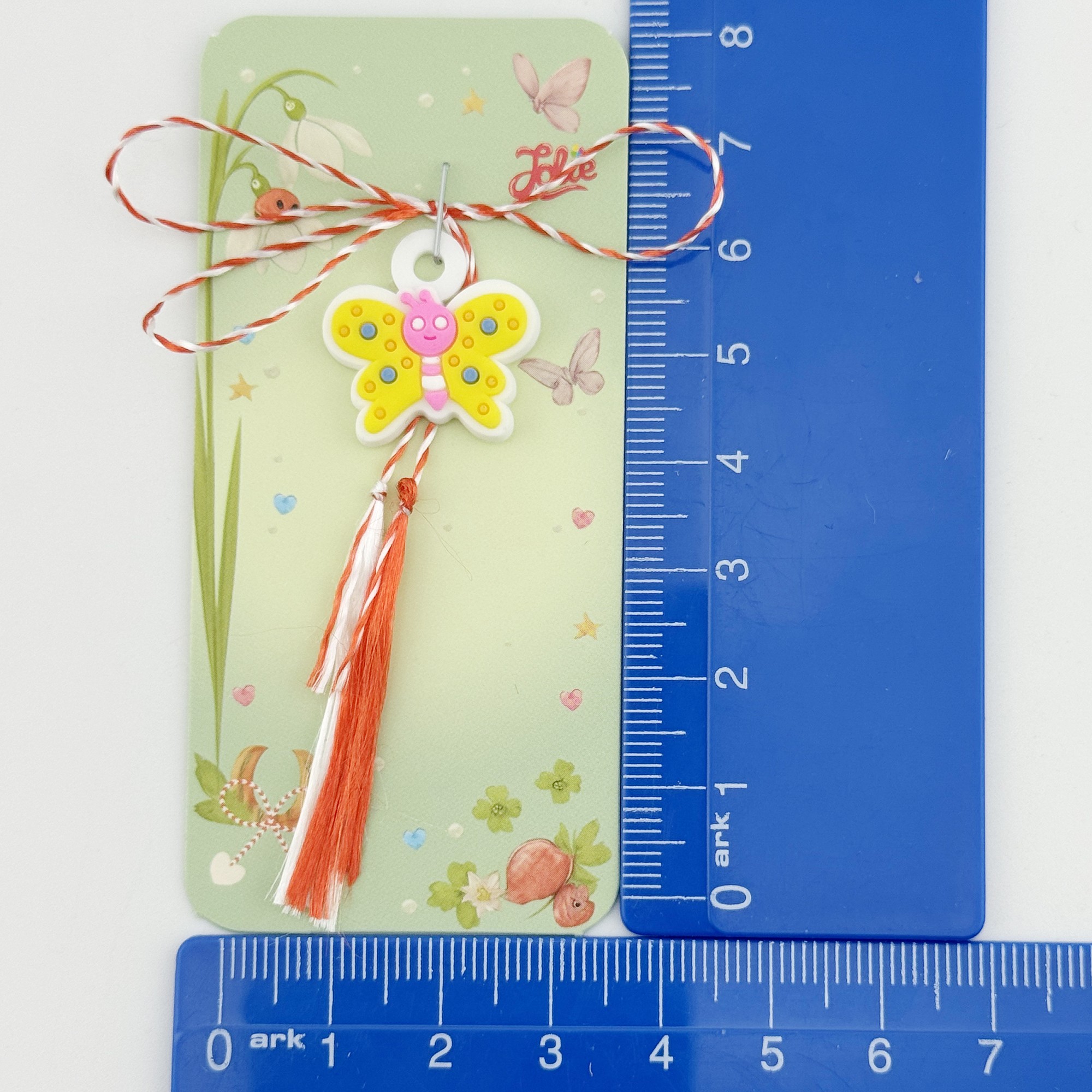 Martisor pentru Copii, Jolie, Model FLUTURE, din Cauciuc, cu Snur Impletit Alb/Rosu, Ambalaj Carton cu Design, Alb/Galben